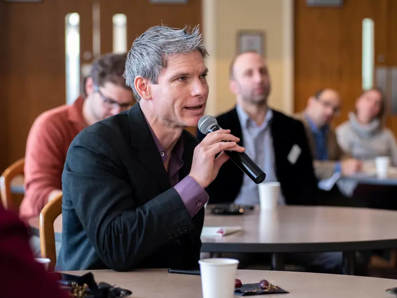man speaking into microphone