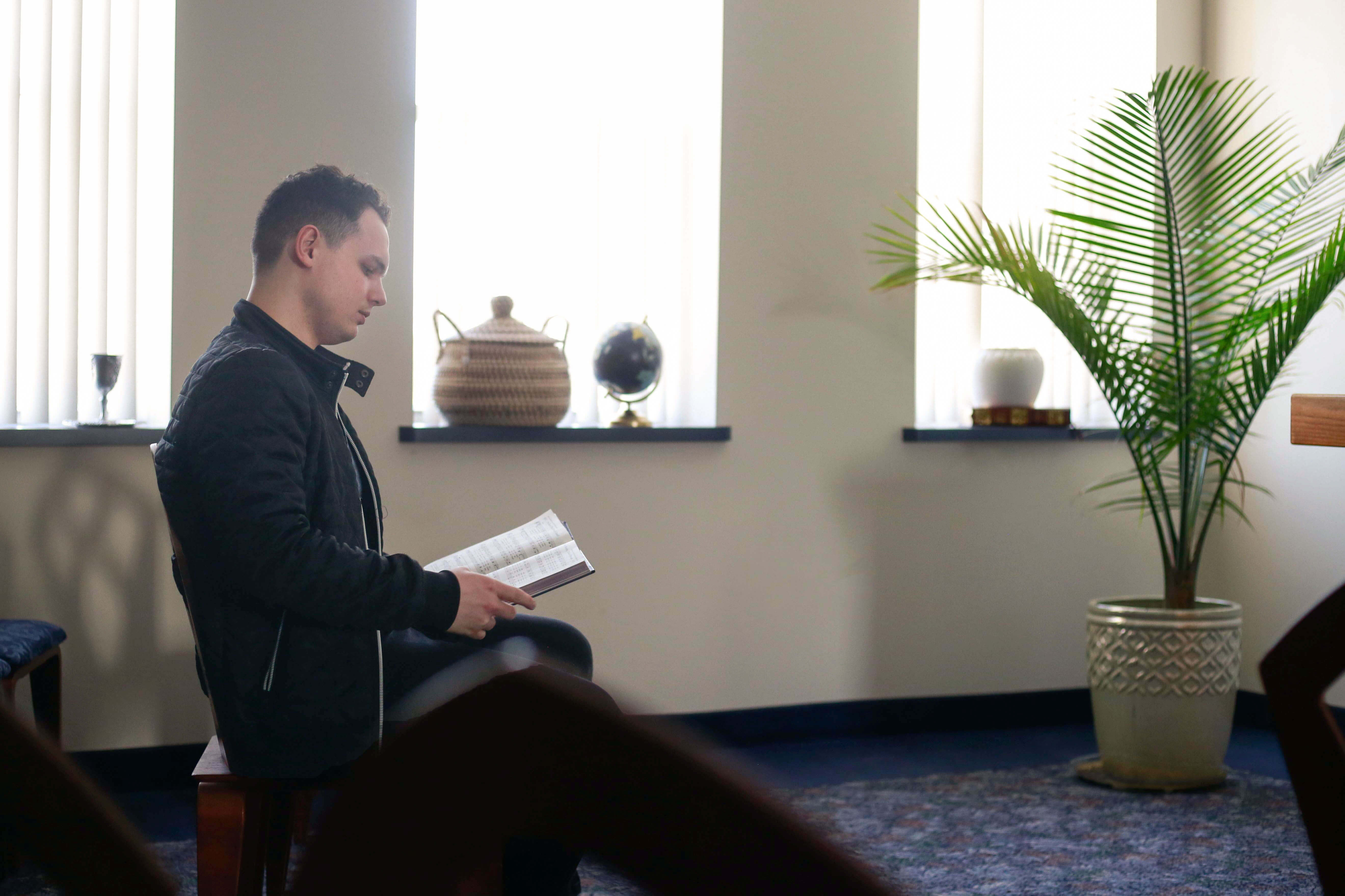 Student reading the bible