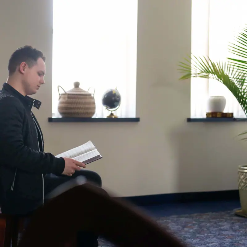 Student reading the bible